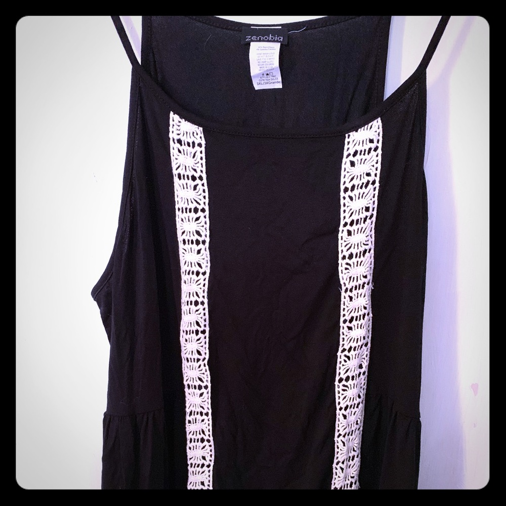 Black tank with white detail.